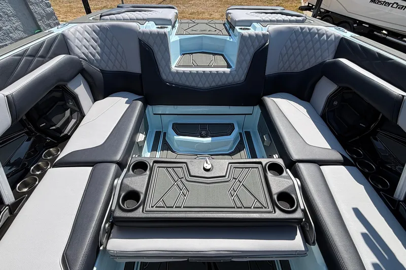 Slide: The Image of Luxurious interior of 2026 Tigé 24RZX boat with stylish seating and cup holders. - 36