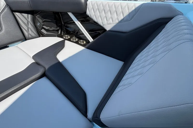 Slide: The Image of 2026 Tigé 24RZX boat interior with luxurious, quilted upholstery and sleek design. - 50