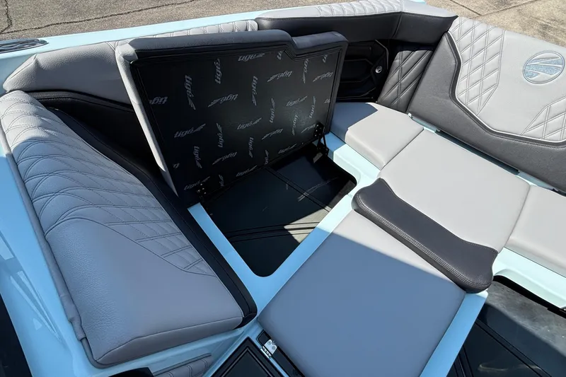 Slide: The Image of 2026 Tigé 24RZX boat interior with luxurious gray seating and stylish design. - 53