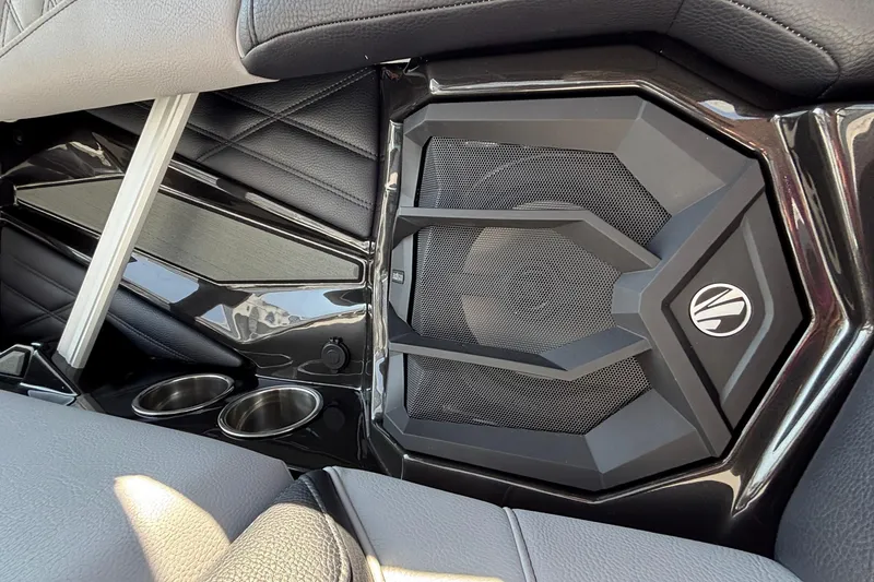 Slide: The Image of 2026 Tigé 24RZX interior with sleek speaker and cup holders. - 56