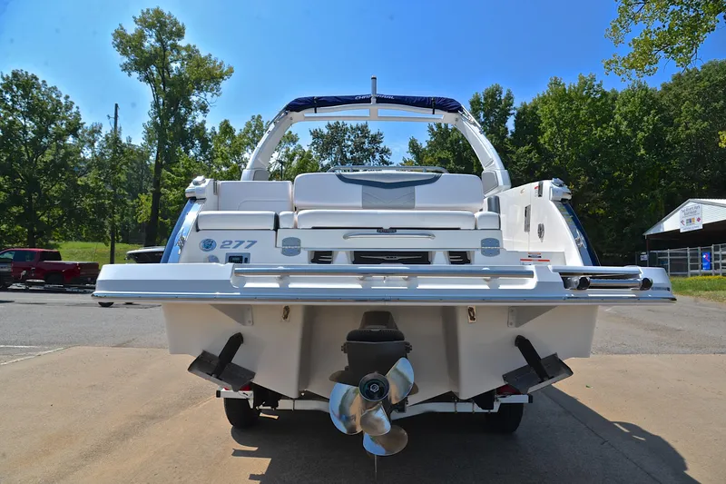 Slide: The Image of 2019 Chaparral 277 SSX boat rear view, showcasing sleek design and powerful propeller. - 15