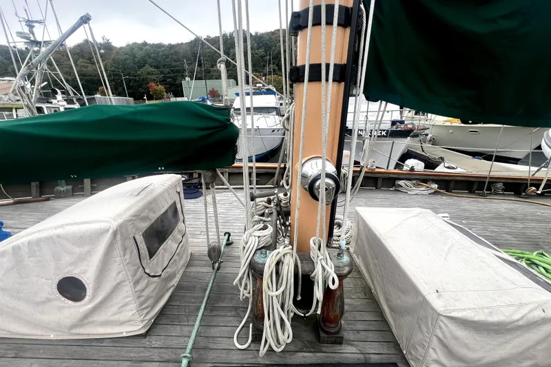 Slide: The Image of Deck view of 1934 Pankey Schooner with ropes and covered equipment. - 10