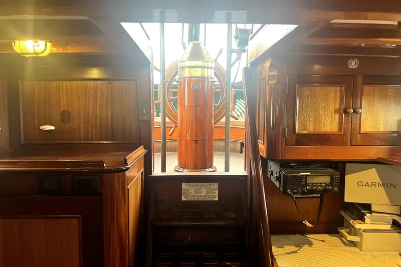 Slide: The Image of Interior of 1934 Pankey Schooner with wooden cabinetry and navigation equipment. - 30