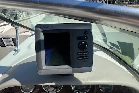 Slide: The Image of 2004 Sea Ray 220 Sundeck dashboard with GPS navigation system. - 2