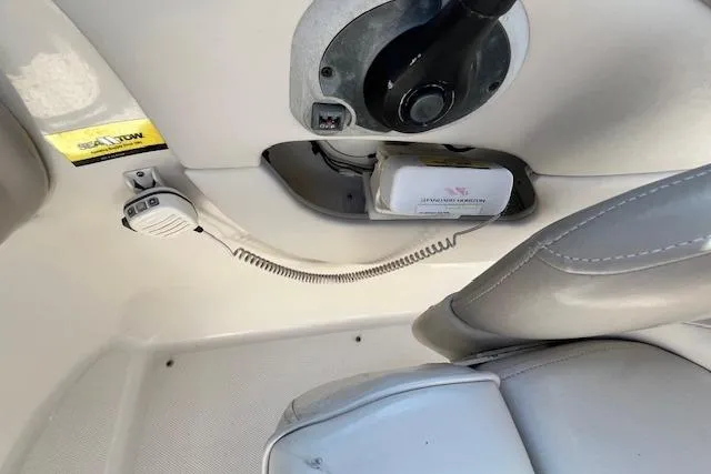 Slide: The Image of Interior of 2004 Sea Ray 220 Sundeck with radio and control panel. - 3