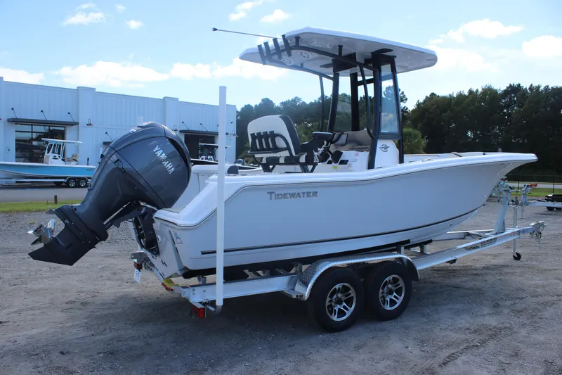 Slide: The Image of 2026 Tidewater 220 CC Adventure boat on trailer with Yamaha outboard motor. - 3