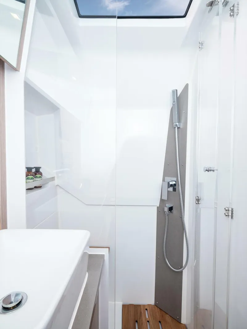 Slide: The Image of Modern bathroom interior of 2026 Sealine S335V yacht with skylight and sleek shower design. - 15