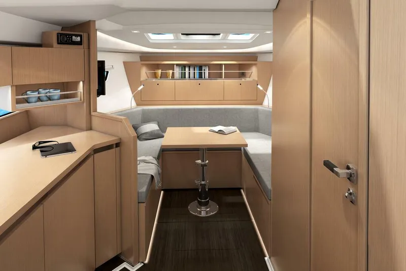 Slide: The Image of 2026 Sealine S335V yacht interior with modern wood finish and cozy seating area. - 21