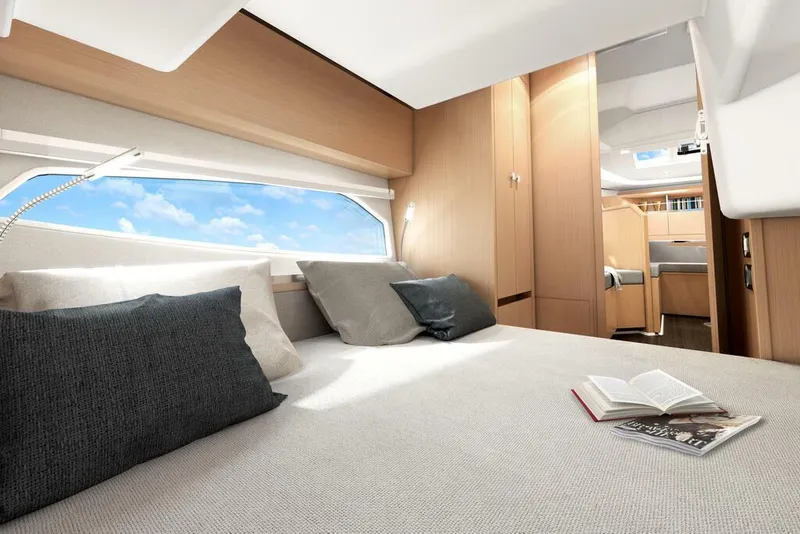 Slide: The Image of Luxurious interior of 2026 Sealine S335V yacht with cozy bed and open book. - 23