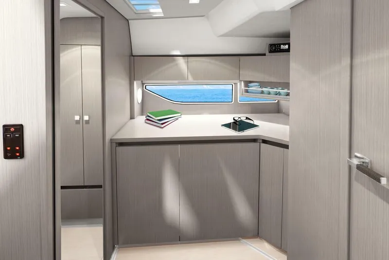 Slide: The Image of Modern interior of 2026 Sealine S335V yacht with sleek cabinetry and ocean view window. - 26