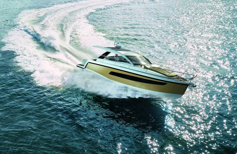 Slide: The Image of 2026 Sealine S335V yacht cruising on open water, creating a dynamic wake. - 6