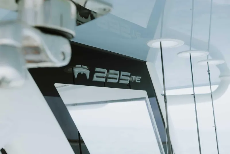Slide: The Image of 2026 World Cat 235TE boat detail with sleek design and modern features. - 14