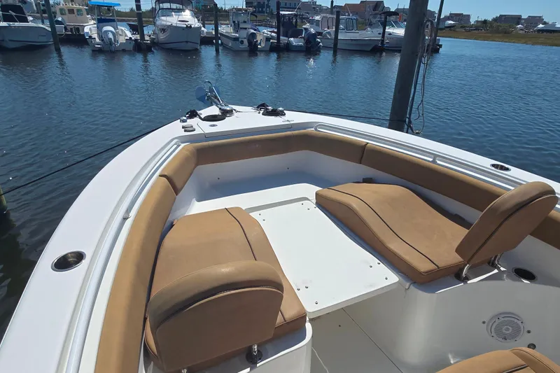 Slide: The Image of Control panel of 2019 Sea Hunt Ultra 255 SE boat with Garmin display and switches. - 9