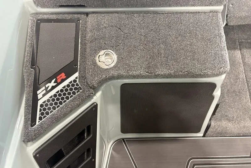 Slide: The Image of 2026 Skeeter FXR20 Apex boat interior with textured flooring and FXR branding. - 17