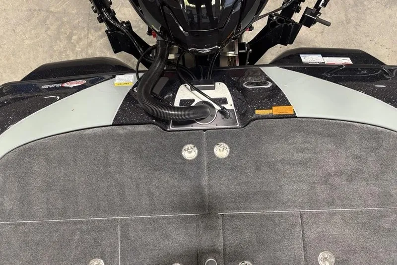 Slide: The Image of 2026 Skeeter FXR20 Apex boat deck with motor and control panel. - 29