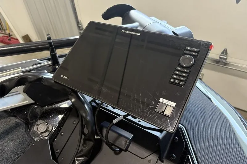 Slide: The Image of 2026 Skeeter FXR20 Apex boat with Humminbird Xplore 12 navigation system. - 3