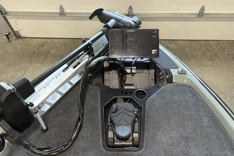 Slide: The Image of 2026 Skeeter FXR20 Apex boat cockpit with advanced navigation system and foot pedal controls. - 7