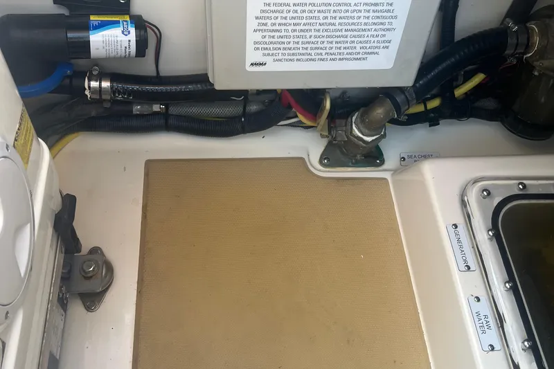 Slide: The Image of Engine compartment of a 2020 Scout 380 LXF boat, showing wiring and components. - 19