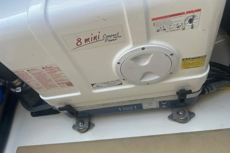 Slide: The Image of Compact power unit labeled "8 mini" on a 2020 Scout 380 LXF boat. - 24