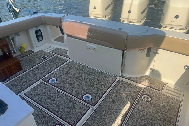 Slide: The Image of 2020 Scout 380 LXF boat deck with seating and outboard motors. - 37