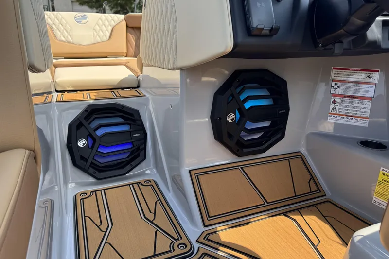 Slide: The Image of 2026 Tigé 24RZX boat interior with premium speakers and stylish seating. - 14