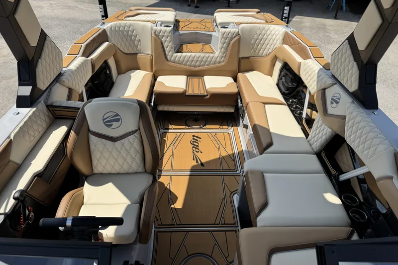 Slide: The Image of Luxurious interior of 2026 Tigé 24RZX boat with plush seating and elegant design. - 9