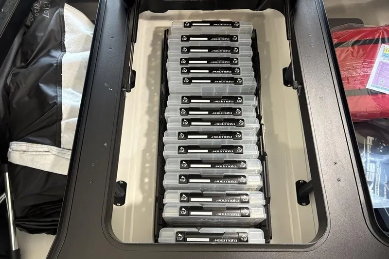 Slide: The Image of Tackle storage in 2026 Skeeter FXR20 FLEX boat, featuring organized fishing gear. - 10