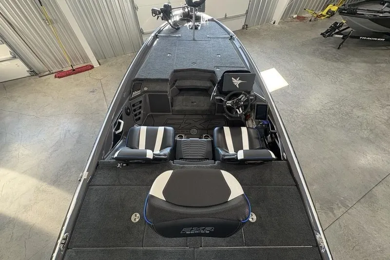Slide: The Image of 2026 Skeeter FXR20 FLEX boat interior with sleek seating and modern dashboard. - 29