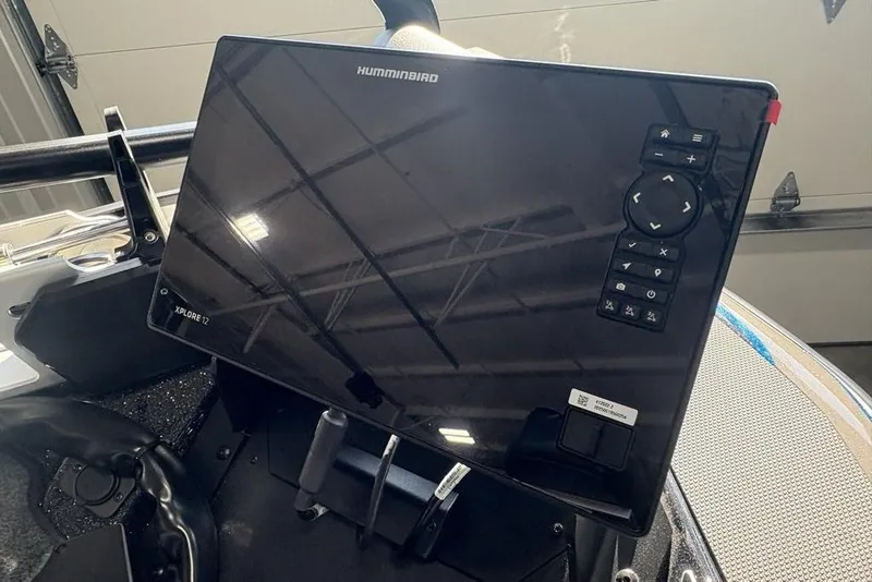 Slide: The Image of 2026 Skeeter FXR20 FLEX boat with Humminbird Xplore 12 display in cockpit. - 4