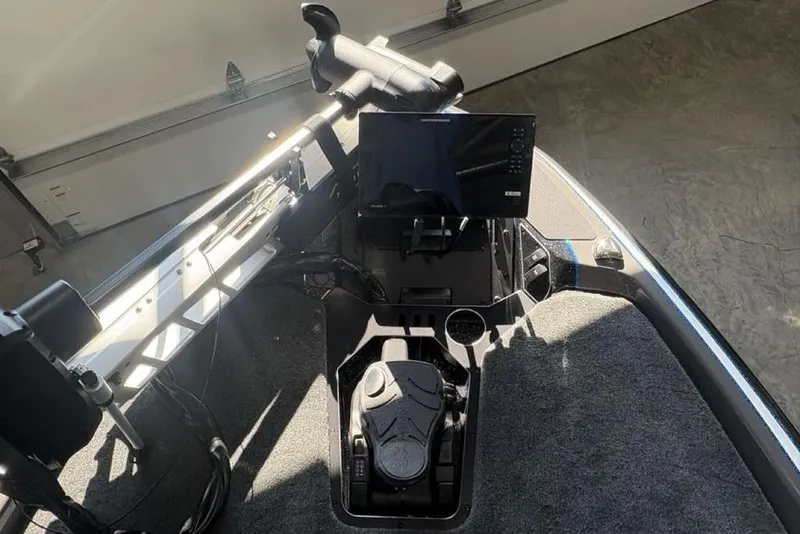 Slide: The Image of 2026 Skeeter FXR20 FLEX boat cockpit with advanced navigation system and controls. - 5