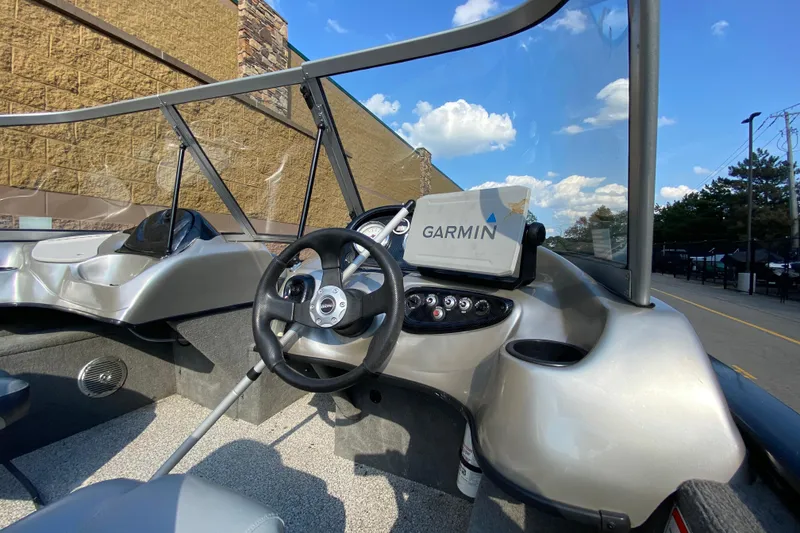 Slide: The Image of 2011 Tracker Pro Guide V-175 Combo boat interior with Garmin navigation system. - 5