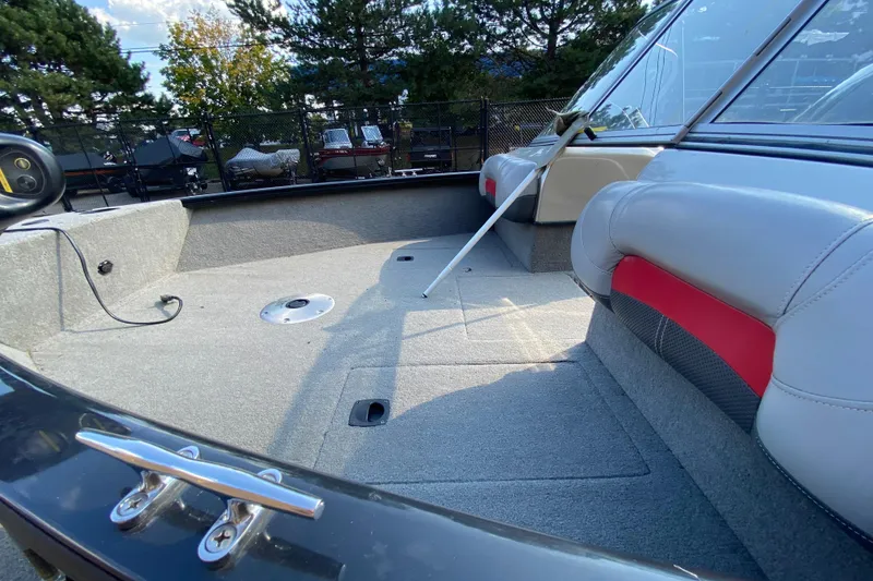 Slide: The Image of 2011 Tracker Pro Guide V-175 Combo boat interior with seating and open deck space. - 6