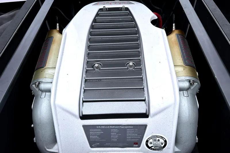 Slide: The Image of 2012 Nautique Sport Nautique 200 engine, 5.7L 350 c.i.d. multi-port fuel injection system. - 12