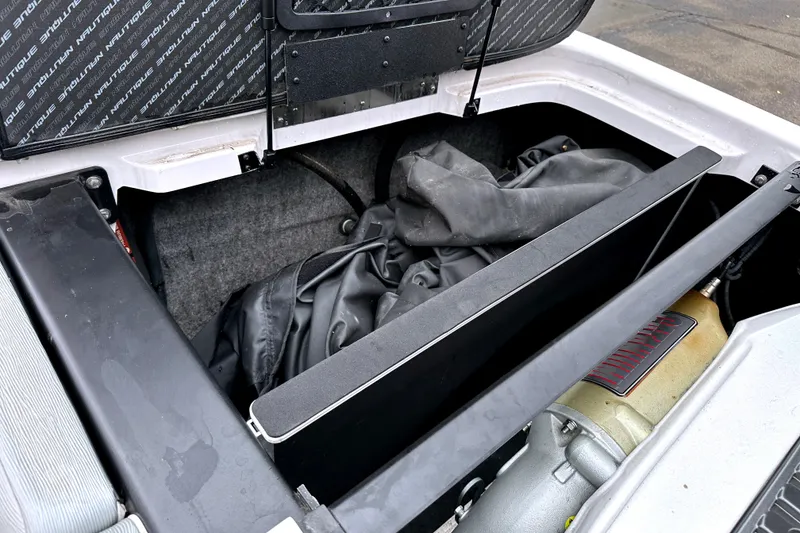 Slide: The Image of Open engine compartment of 2012 Nautique Sport Nautique 200 boat. - 14