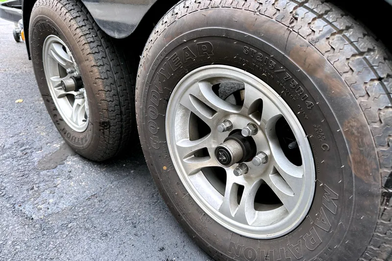 Slide: The Image of Trailer wheels of a 2012 Nautique Sport Nautique 200 with Goodyear Marathon tires. - 18
