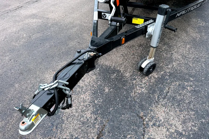 Slide: The Image of Trailer hitch of a 2012 Nautique Sport Nautique 200 on asphalt. - 19