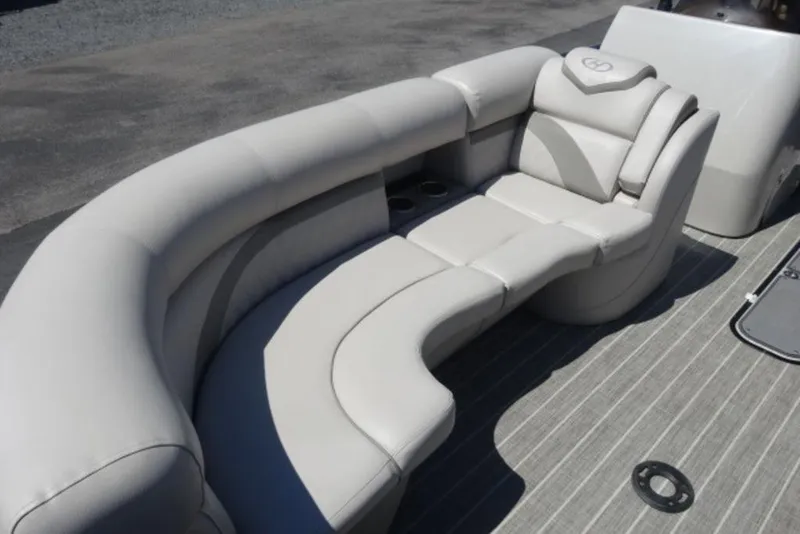 Slide: The Image of Luxurious seating on 2017 Harris Sunliner 240 pontoon boat, featuring plush, curved design. - 11