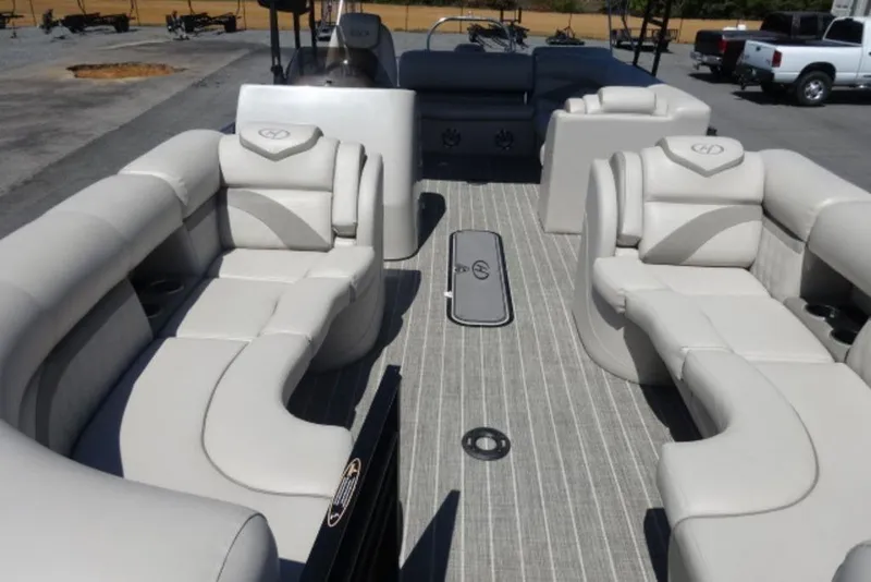 Slide: The Image of 2017 Harris Sunliner 240 pontoon boat with spacious seating and modern design. - 4