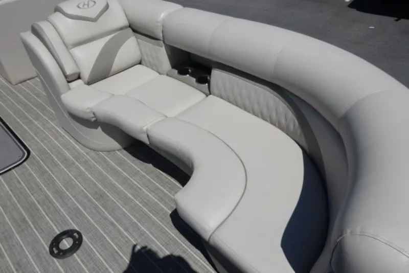 Slide: The Image of Luxurious seating on 2017 Harris Sunliner 240 pontoon boat with plush upholstery. - 7