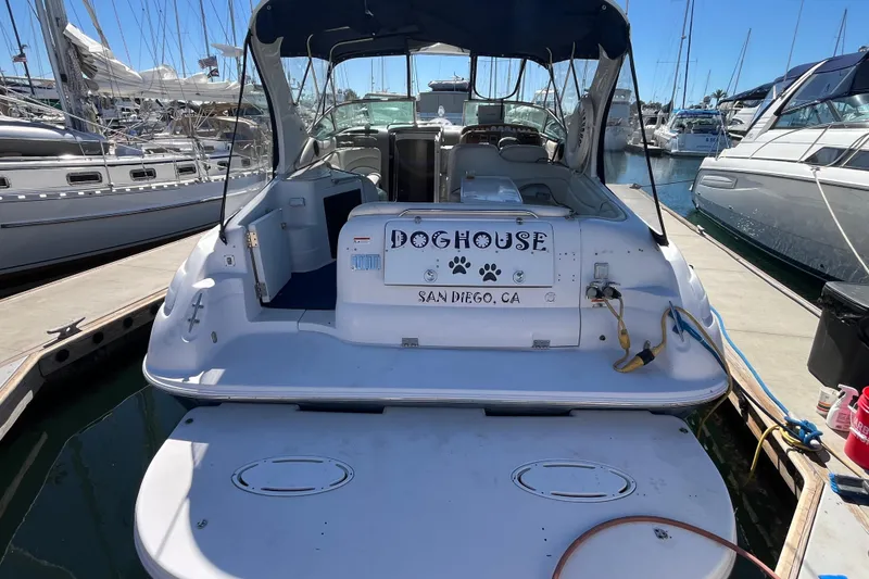 Slide: The Image of 2005 Larson-Cabrio 370 boat docked in San Diego marina, rear view. - 4