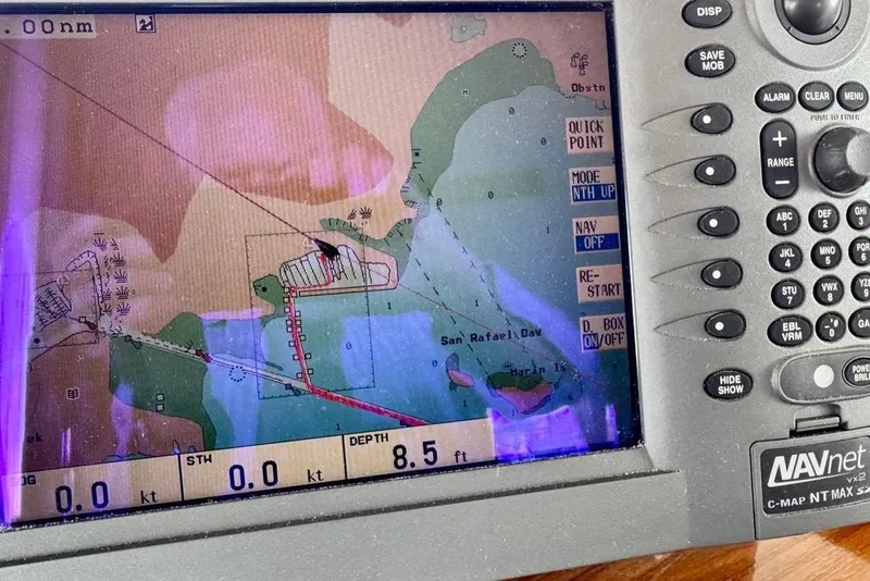 Slide: The Image of Navigation system display on a 1978 Grand Banks Classic boat, showing San Rafael Bay map. - 64