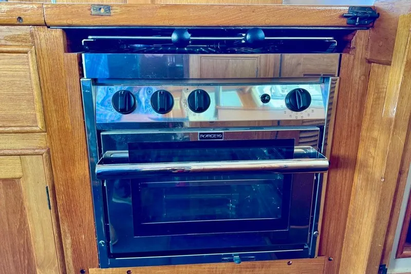 Slide: The Image of Vintage Force 10 stove in 1978 Grand Banks Classic yacht kitchen. - 67