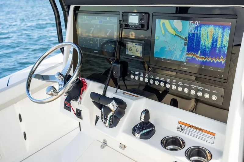 Slide: The Image of Helm of 2026 World Cat 325CC with advanced navigation and control systems. - 18