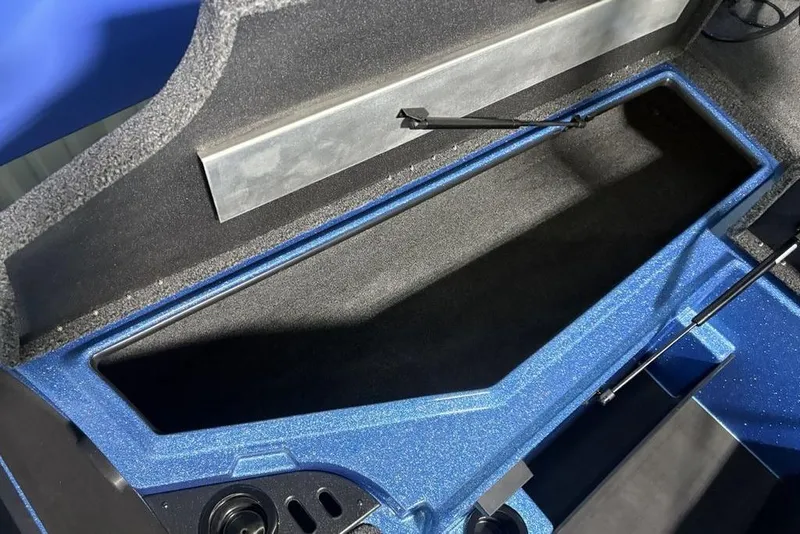 Slide: The Image of Spacious storage compartment in 2026 Nitro Z18 Pro boat, featuring sleek blue interior design. - 11