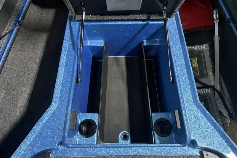 Slide: The Image of 2026 Nitro Z18 Pro boat storage compartment with blue interior and hydraulic lifts. - 12