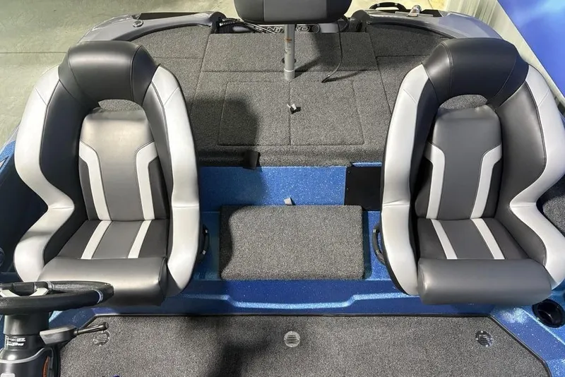 Slide: The Image of Interior of 2026 Nitro Z18 Pro boat with dual gray and black seats. - 13