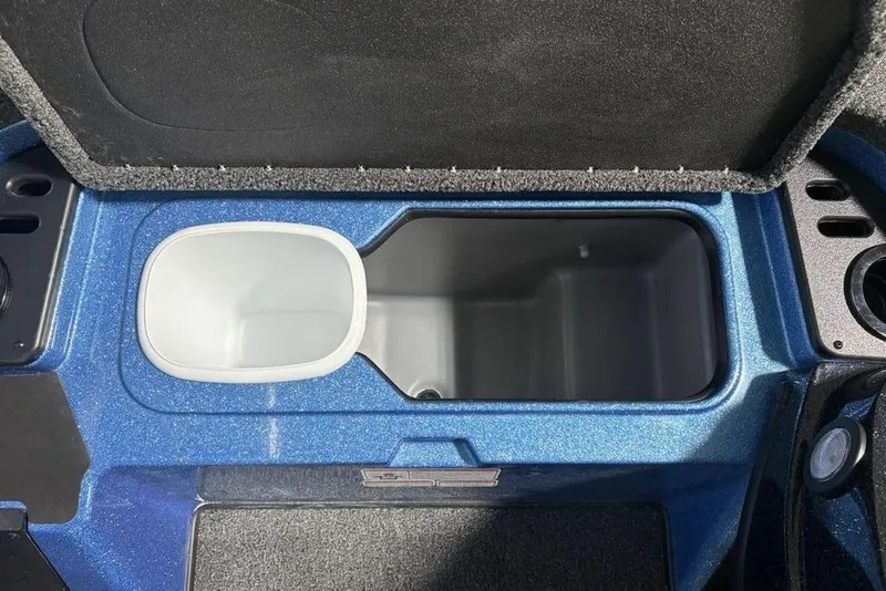 Slide: The Image of Open storage compartment in 2026 Nitro Z18 Pro boat, featuring blue interior design. - 15