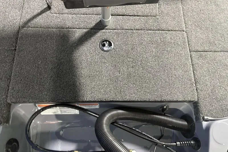 Slide: The Image of Interior view of 2026 Nitro Z18 Pro boat with carpeted flooring and visible wiring. - 20