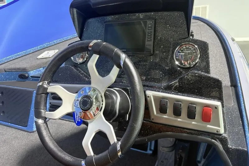 Slide: The Image of Steering console of 2026 Nitro Z18 Pro boat with modern controls and dashboard. - 21