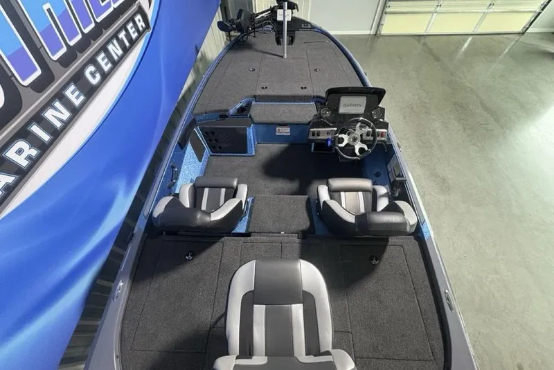 Slide: The Image of 2026 Nitro Z18 Pro boat interior with steering console and seating. - 32